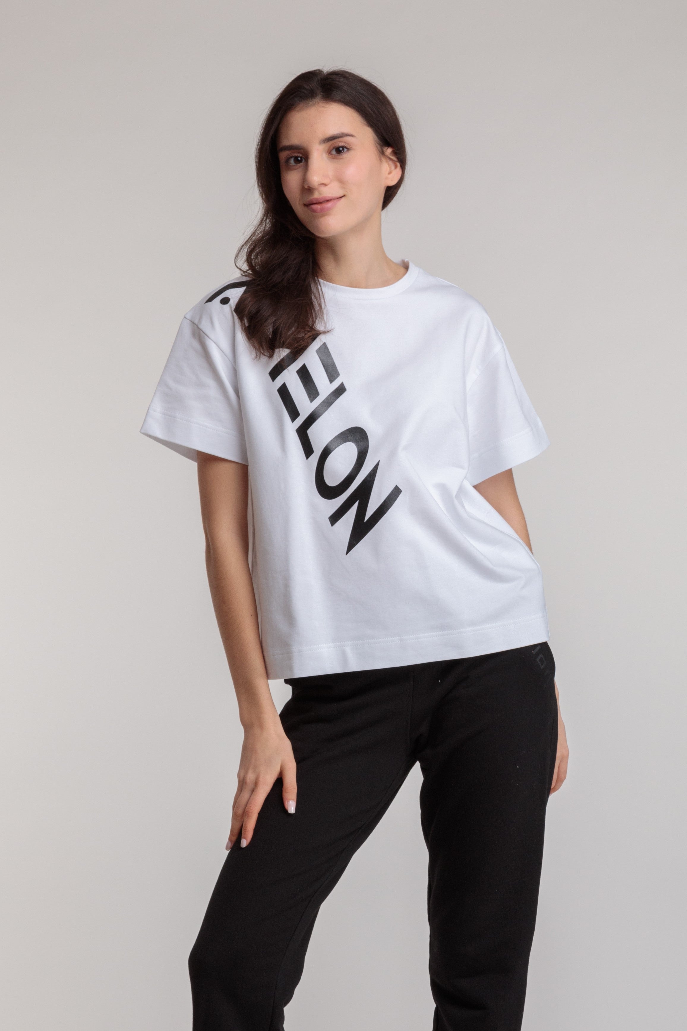 Women's straight white t-shirt with a large black lettering