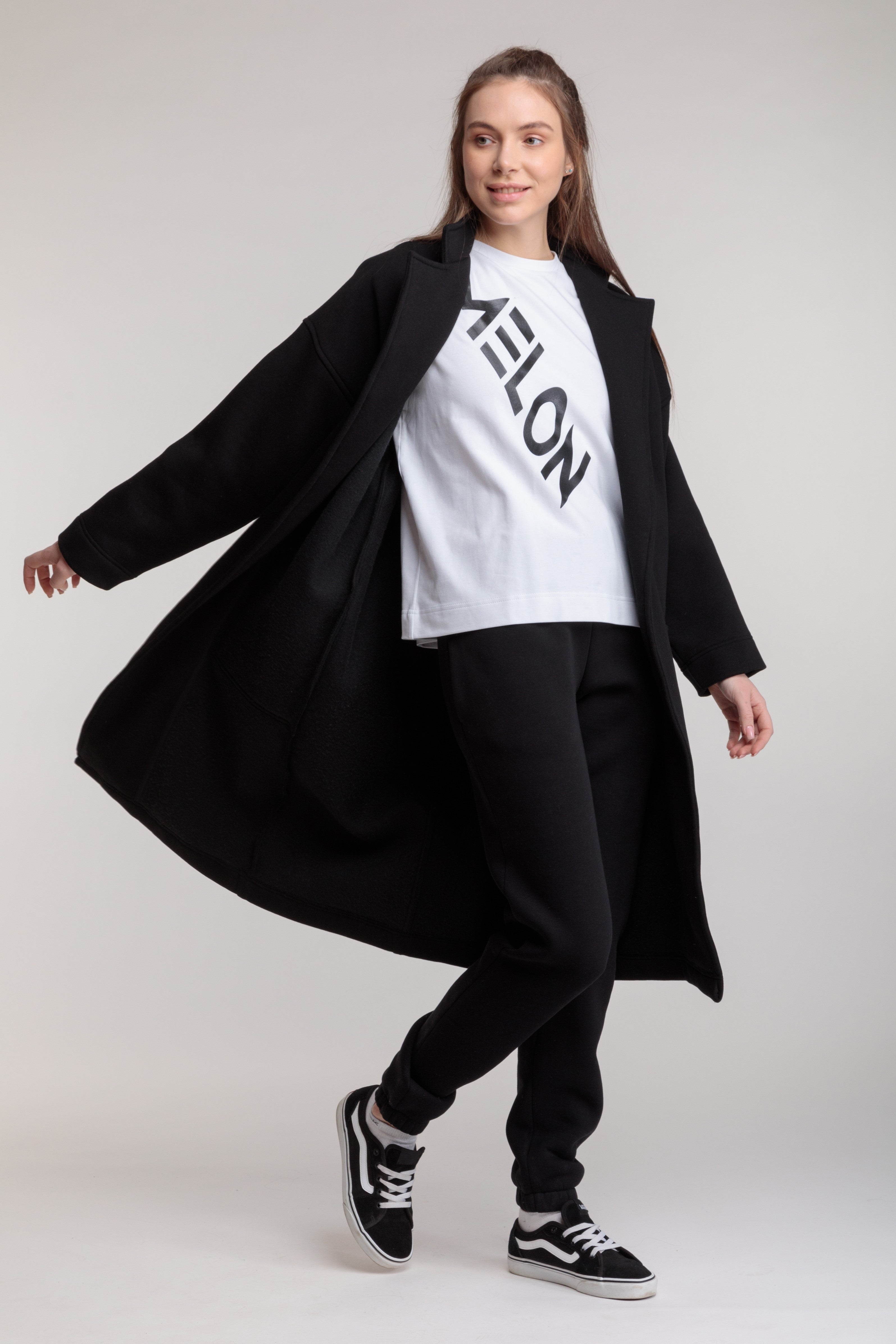 Long cotton coat-cardigan in black color with a wrap belt and pockets