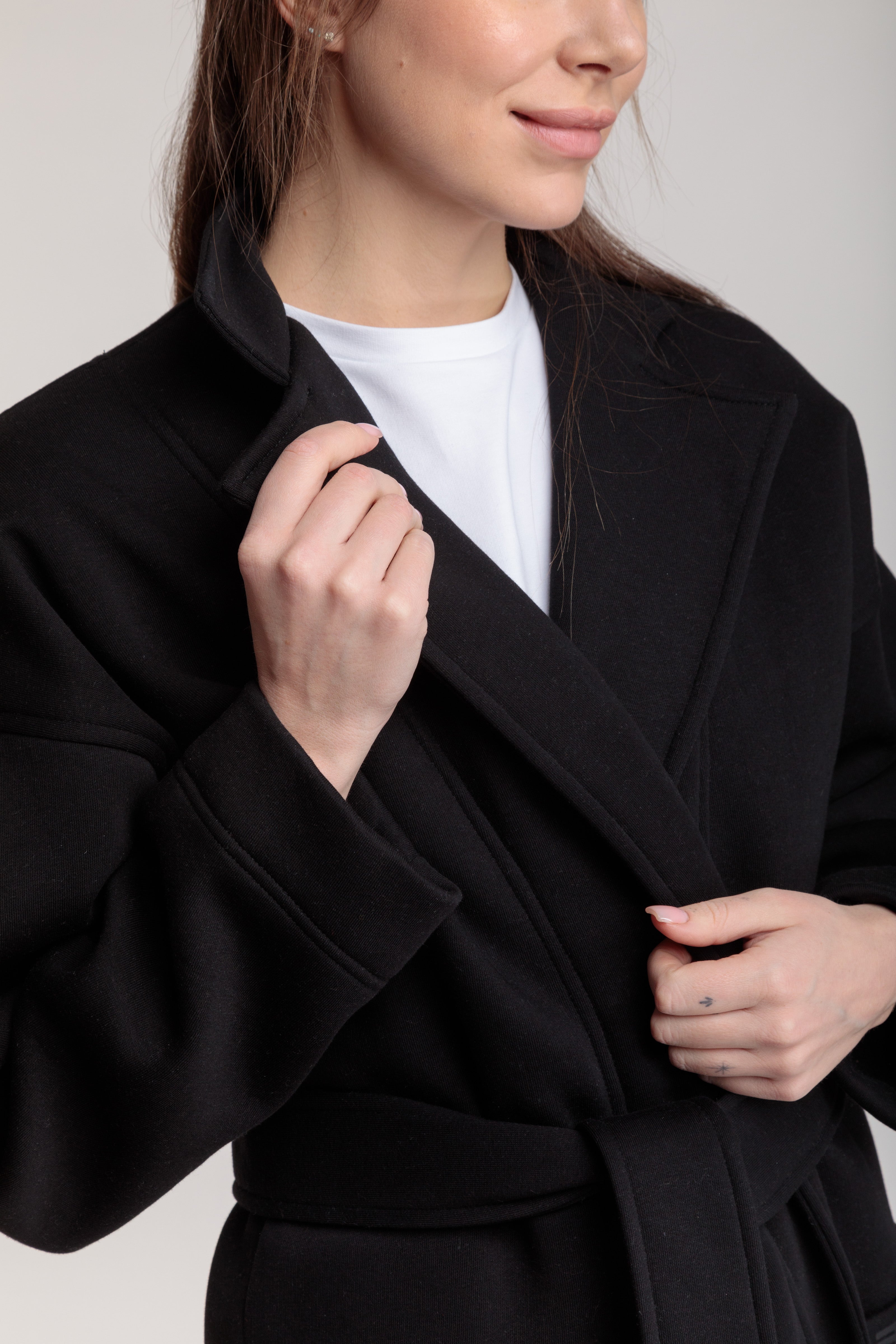 Long cotton coat-cardigan in black color with a wrap belt and pockets