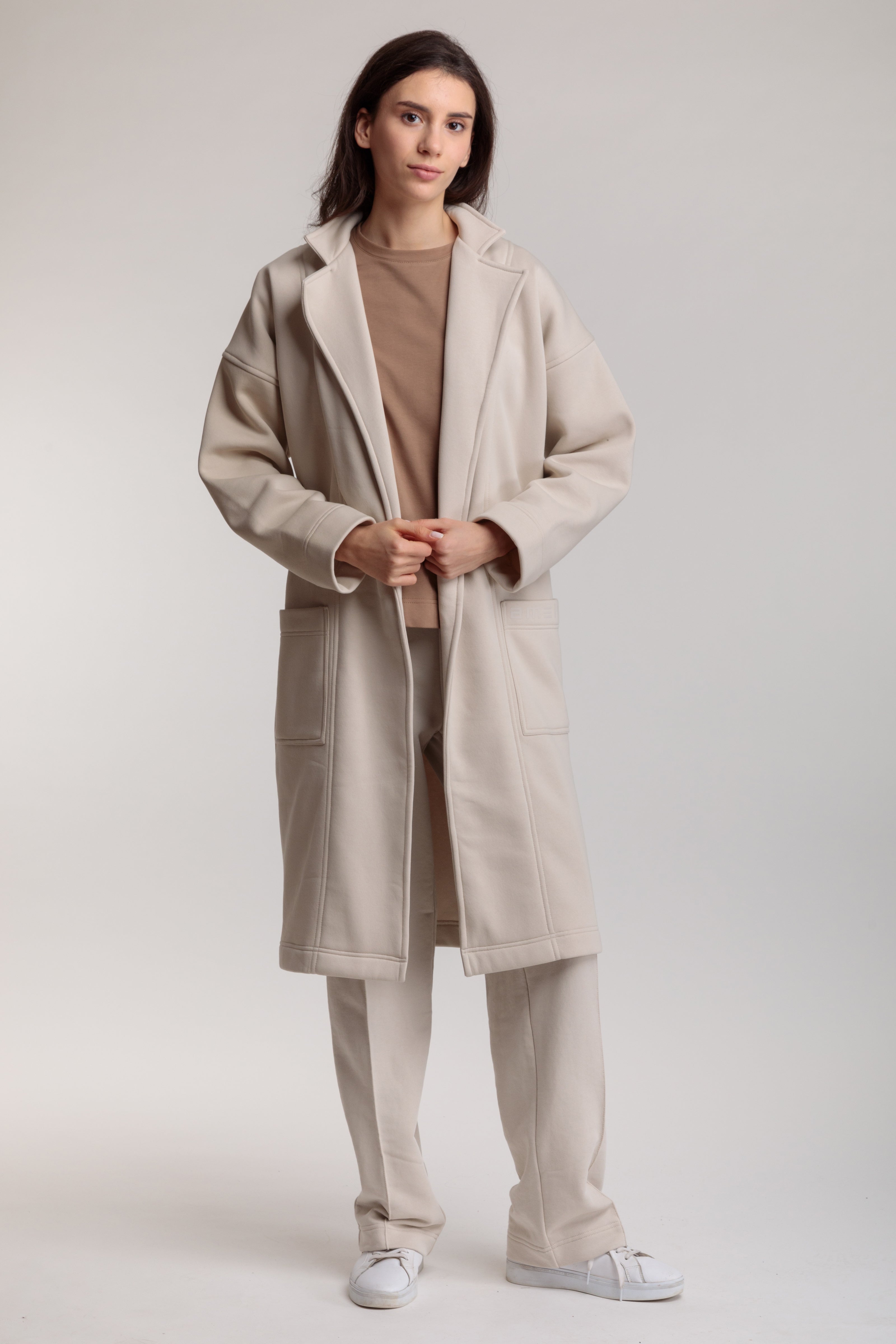 Long cotton coat-cardigan in milky color with a wrap belt and pockets